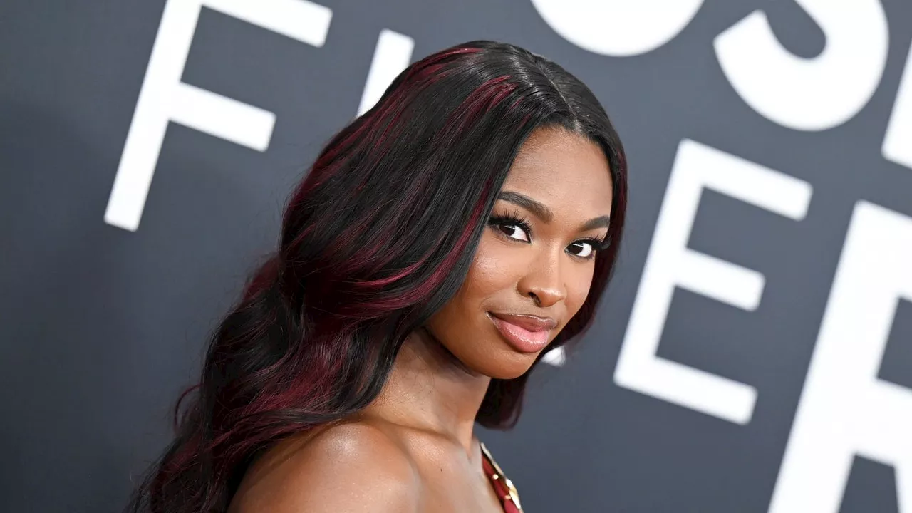 Coco Jones Shines in Berry Red Gown at the 2025 Grammys