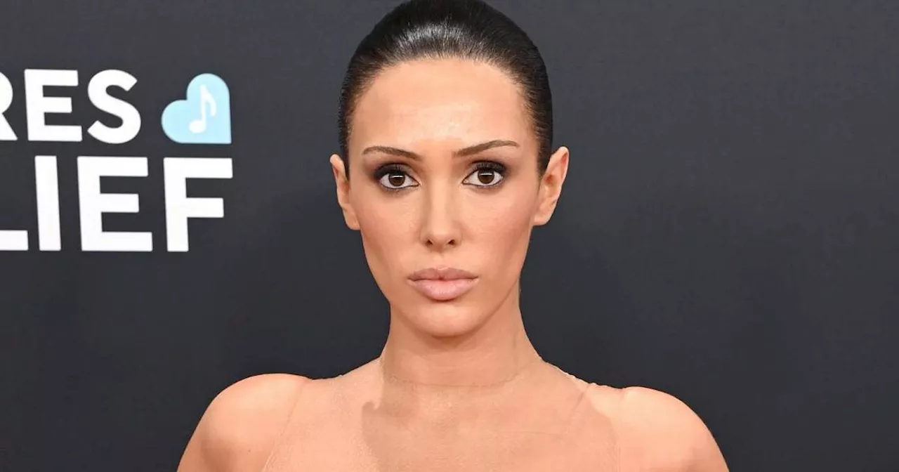 Kanye's wife risks indecent exposure charge as fans slam nude Grammys dress