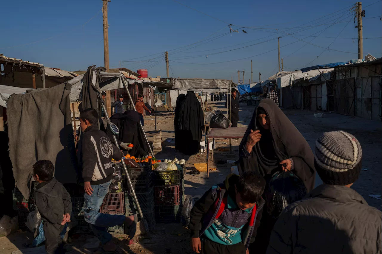 Trump's aid freeze shocks a Syria camp holding families linked to the Islamic State group