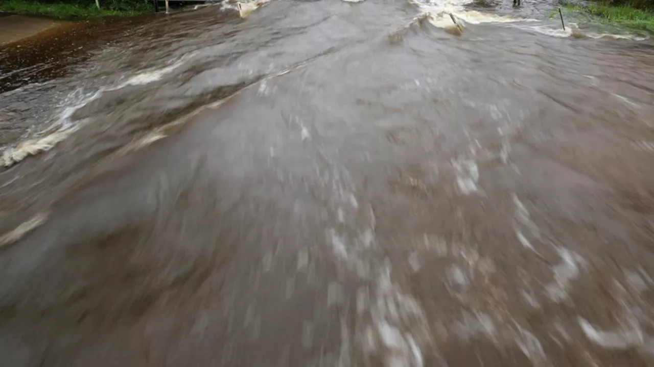 Trial begins into deaths of two men swept kilometres away by deadly floodwaters