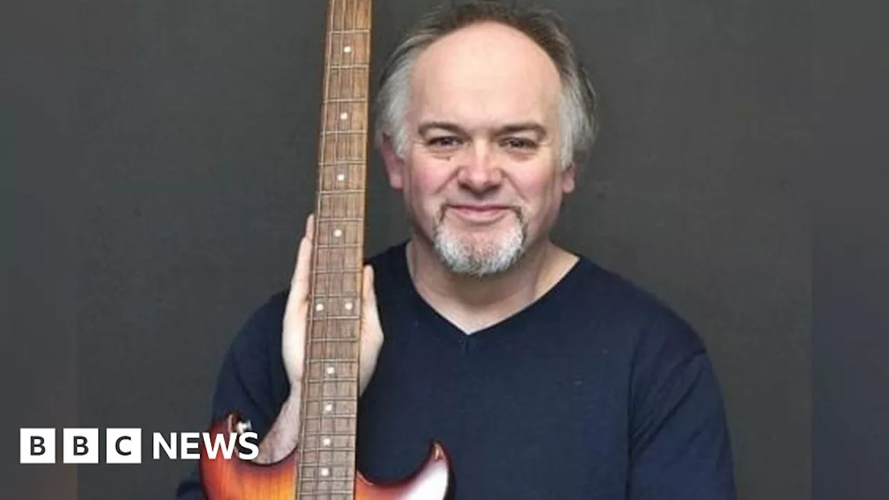 Genesis Tribute Band Member Found Dead in Submerged Car