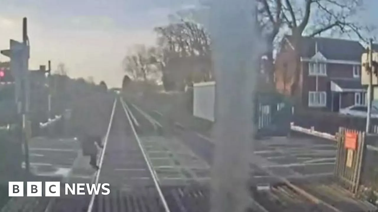 Woman's near miss with train at level crossing in Southport