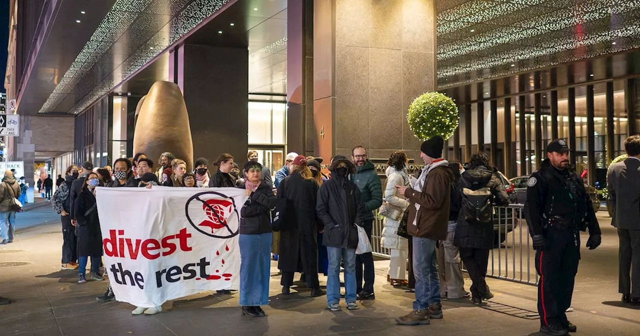 Protesters Gather Outside Toronto Hotel During Giller Award Ceremony