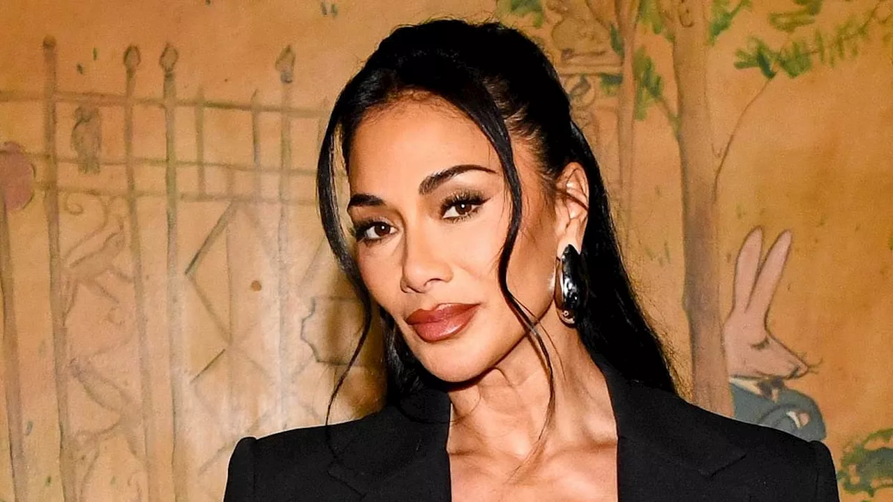 Nicole Scherzinger stuns in a mesh bralette at Michael Kors' Madison Avenue boutique launch party