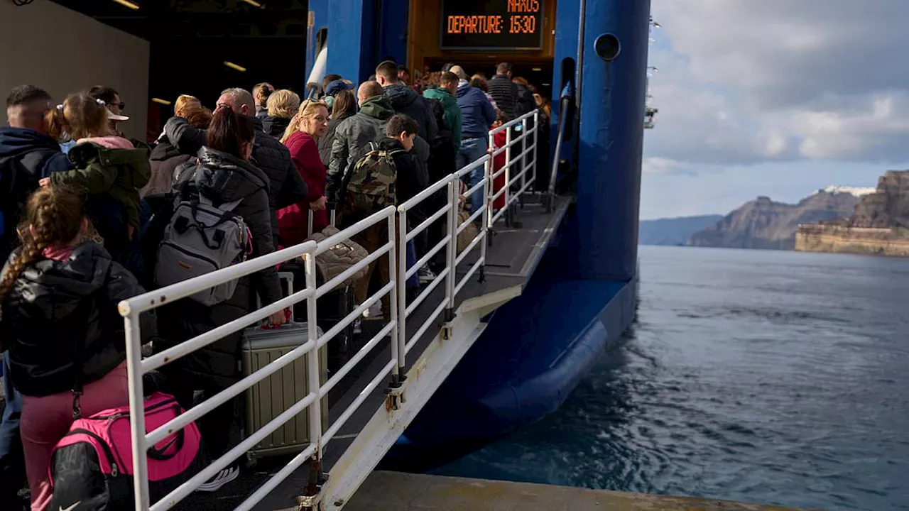 Race to escape earthquake island: Locals flee Santorini as volcanic holiday spot is hit by hundreds...