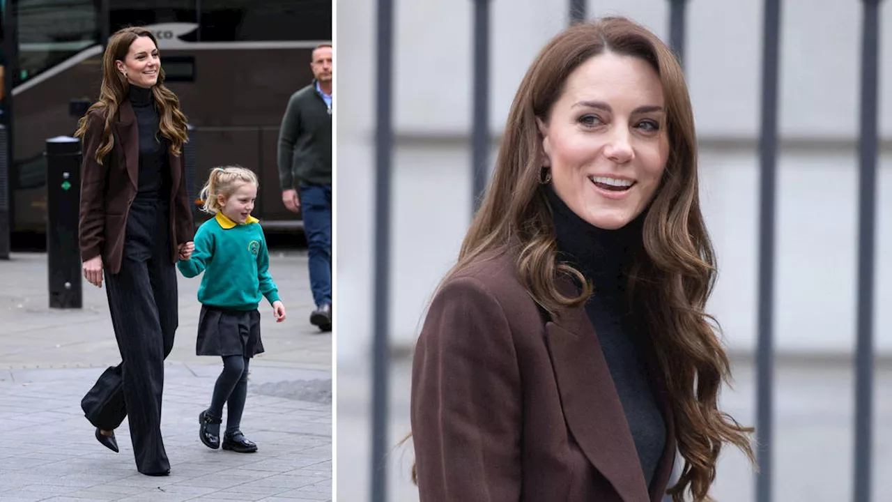 Princess of Wales walks hand-in-hand with school children on trip to National Portrait Gallery