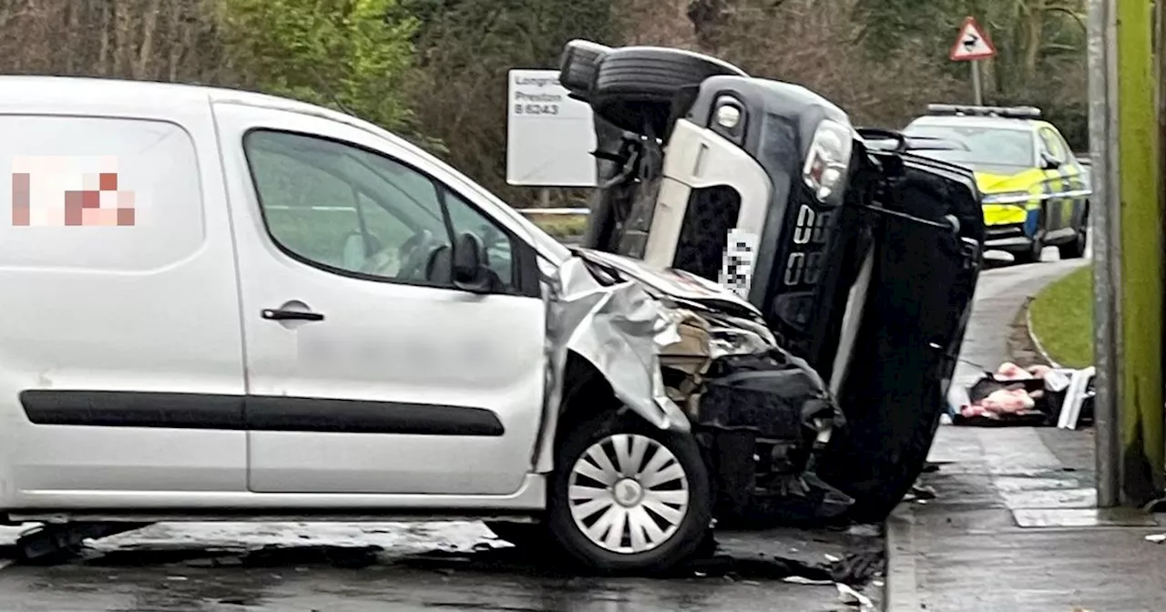 Car flips over in dramatic crash before police close road for hours