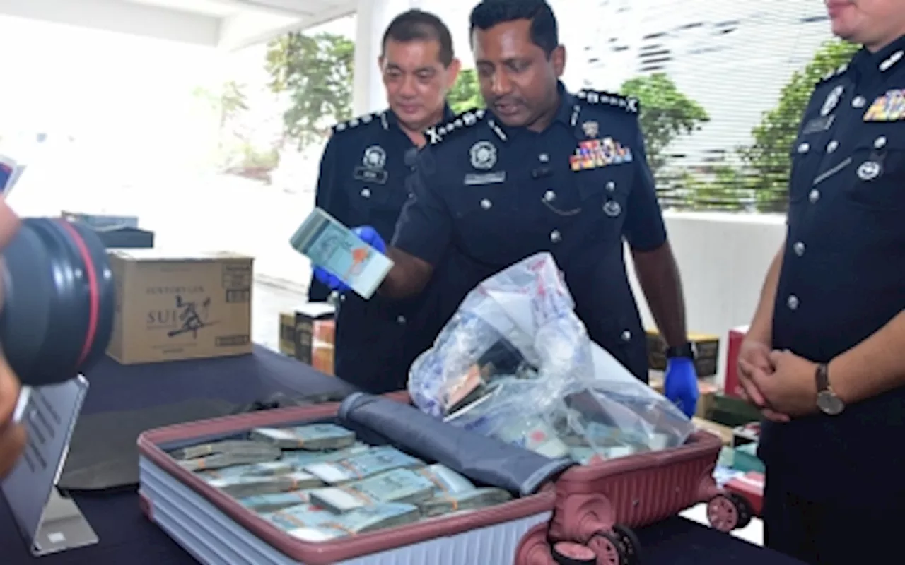 Mystery solved as suitcase with RM500,000 reunited with owner after eight months