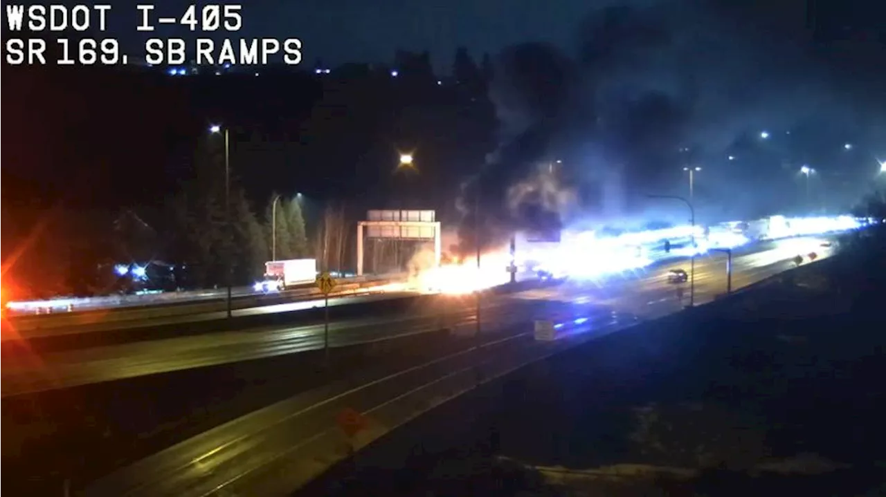 Rolled-over semi-truck catches fire on I-405, shuts down most northbound lanes near SR 169 interchange