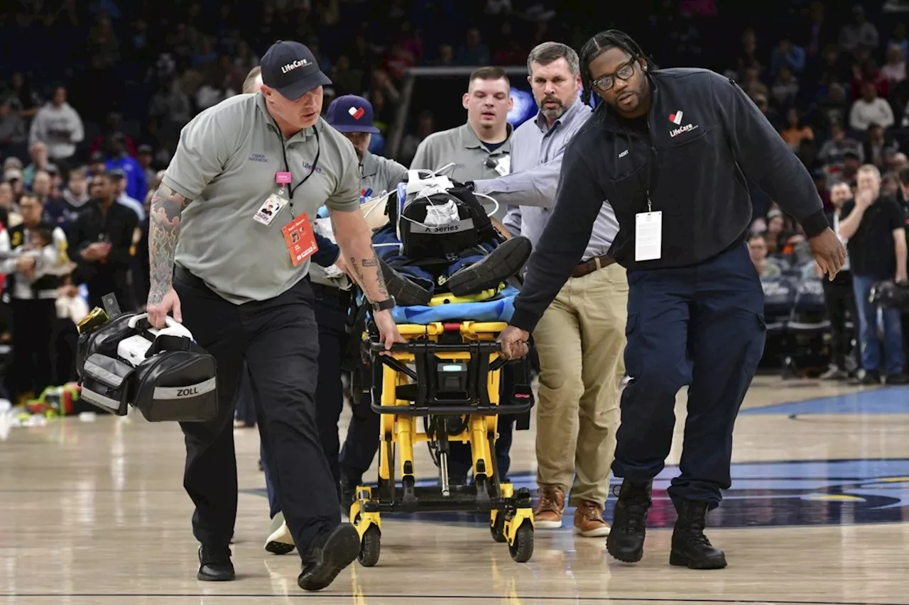 Fan Collapses Courtside, Delaying NBA Game