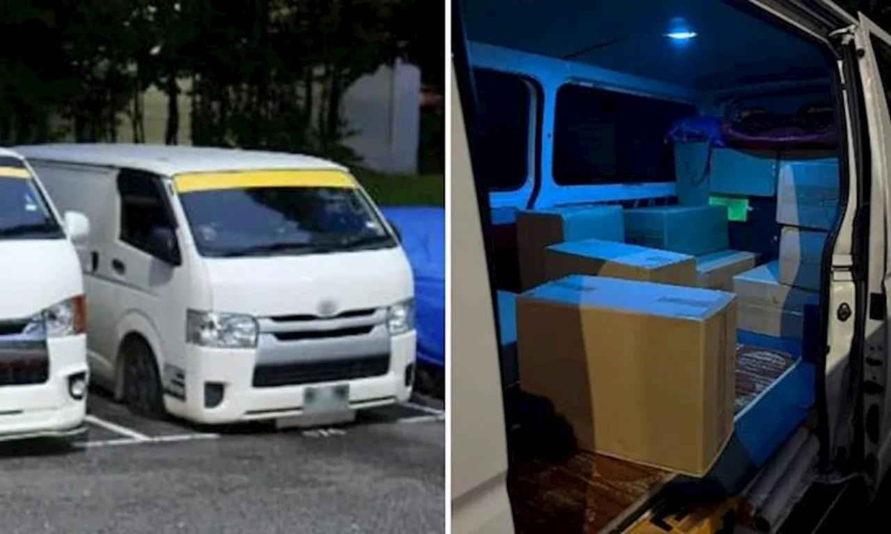 Van parked in Petir Road found with 1,252 cartons of illegal cigarettes, man and woman arrested