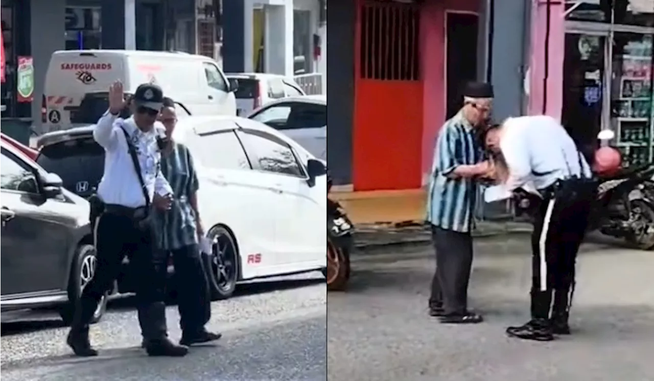 Police Officer's Kindness Goes Viral After Helping Elderly Man Cross the Road