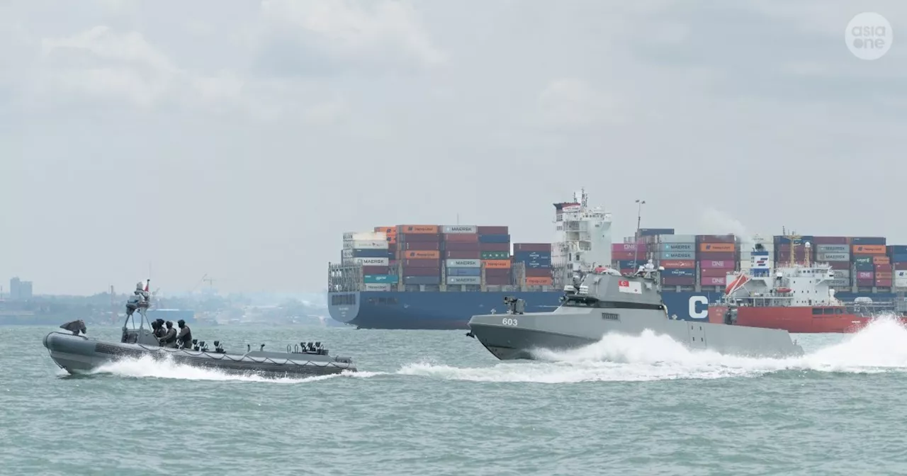 Singapore Navy's USV Intercepts Suspicious Boat in Singapore Strait