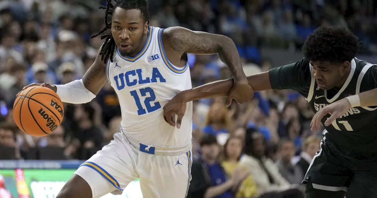 UCLA men withstand late pressure to get an impressive victory over No. 9 Michigan State