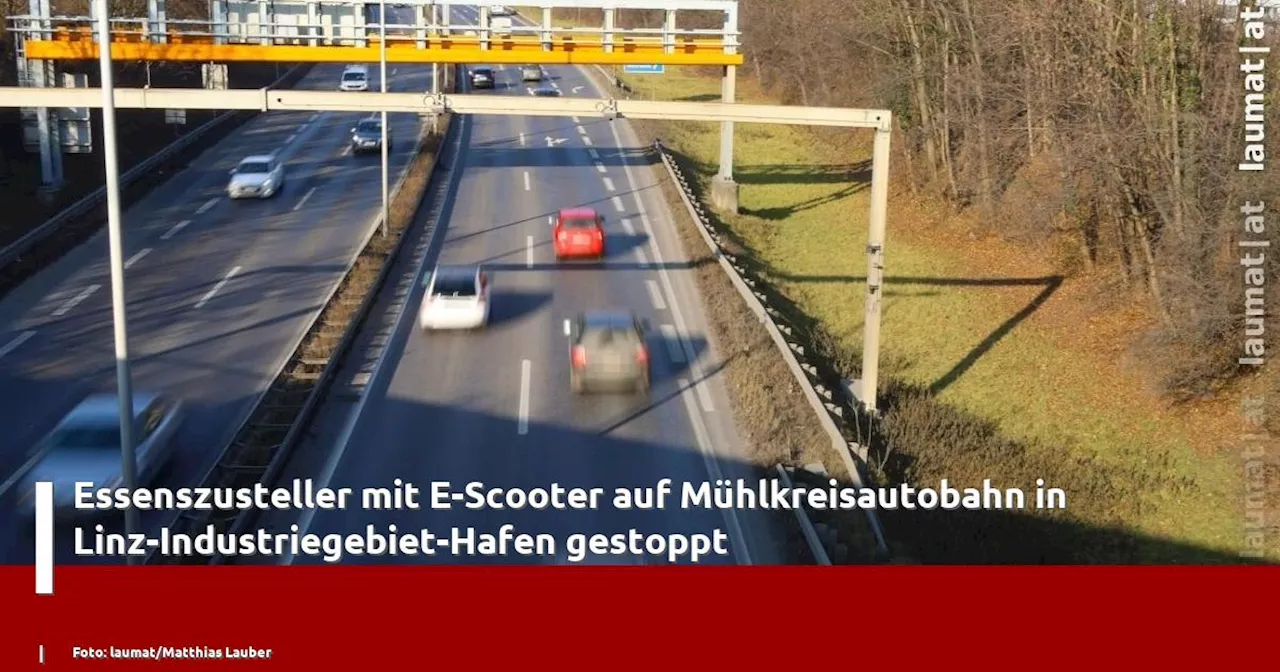 Essenszusteller mit E-Scooter auf M�hlkreisautobahn in Linz-Industriegebiet-Hafen gestoppt