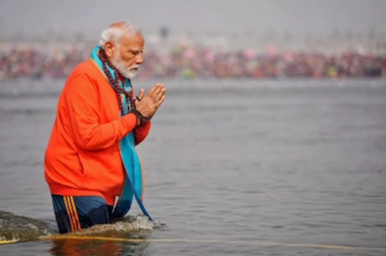 Modi takes ritual Kumbh Mela dip, fuelling BJP’s state election push amid deadly stampede fallout