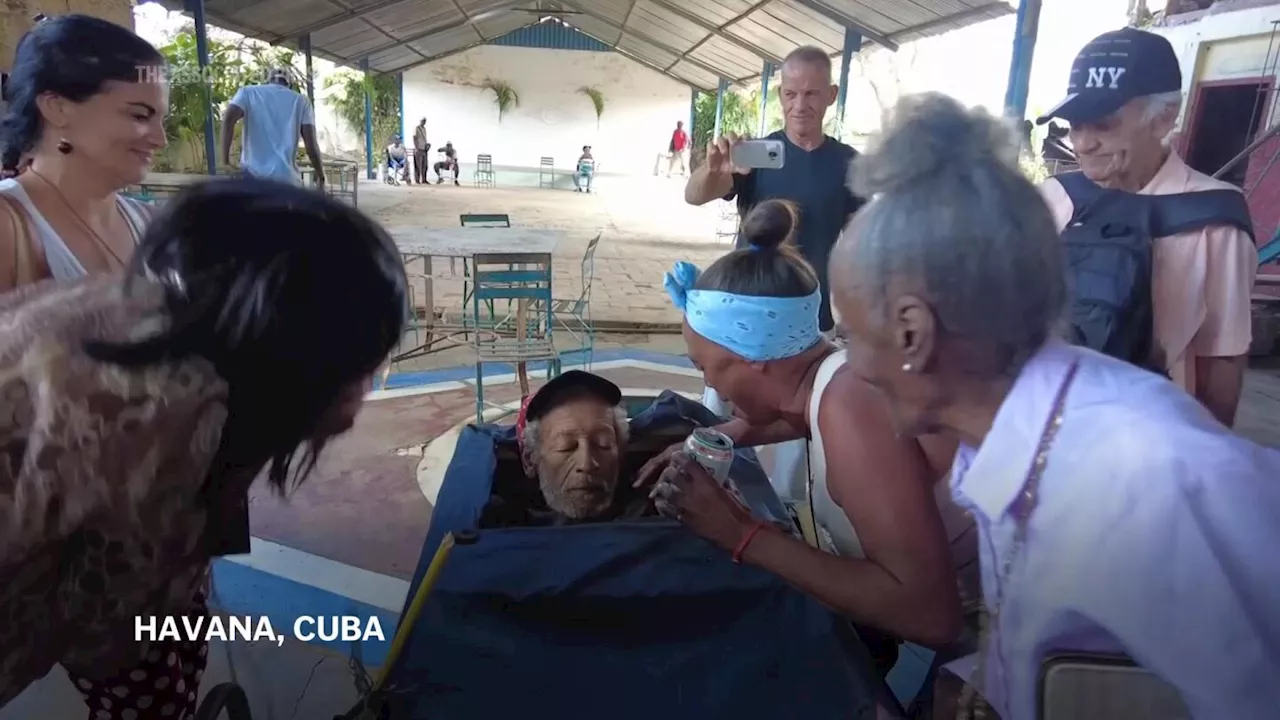 Cubans celebrate life and death with a mock funeral