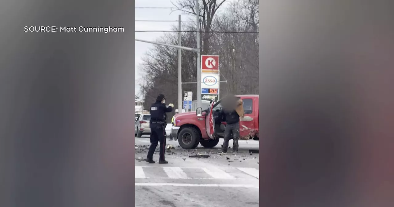 Man armed with a hatchet arrested after dramatic Kitchener, Ont. takedown