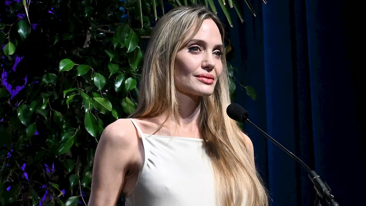 Angelina Jolie breaks down in tears as she pays tribute to her late mother while accepting the...