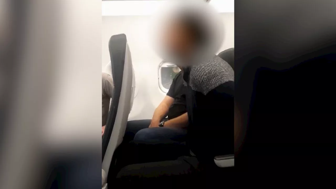 Frontier Airlines Passenger Restrained by Fellow Travelers After Window-Banging Incident