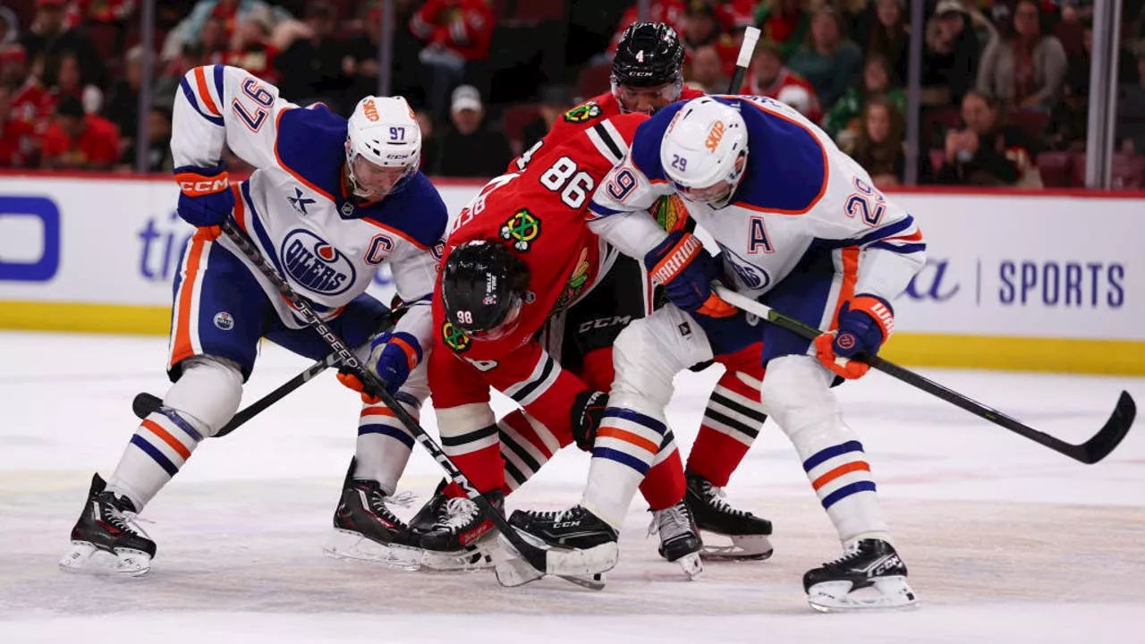 McDavid, Hyman Lead Oilers Past Blackhawks in Overtime