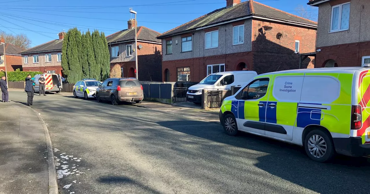 Forensics descend on quiet Greater Manchester street following incident