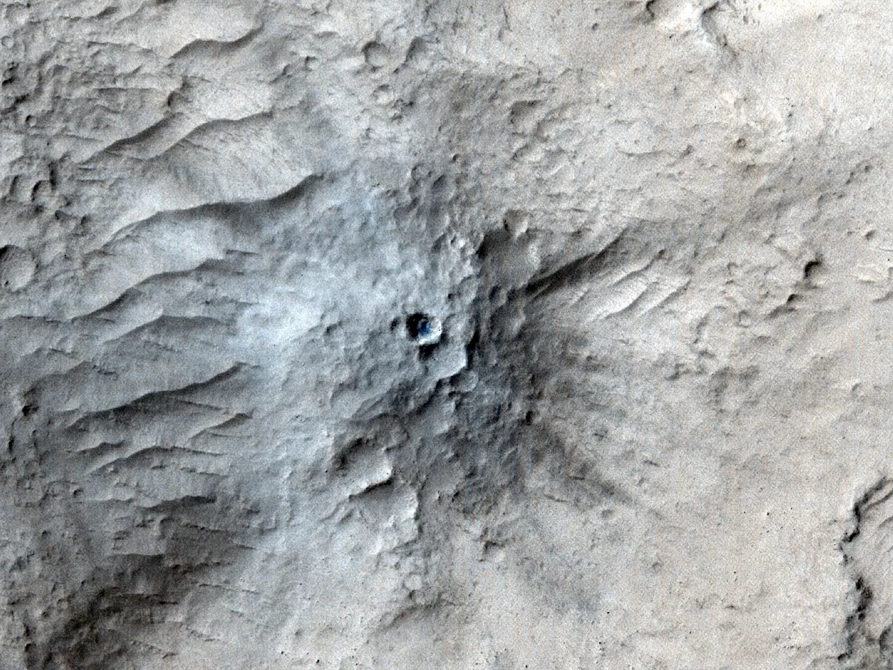 A Recent Impact on Mars Shook the Planet to Its Mantle