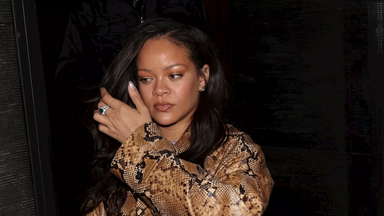 Rihanna Revisits a Snakeskin Supreme Trench for Cousin's Birthday Dinner