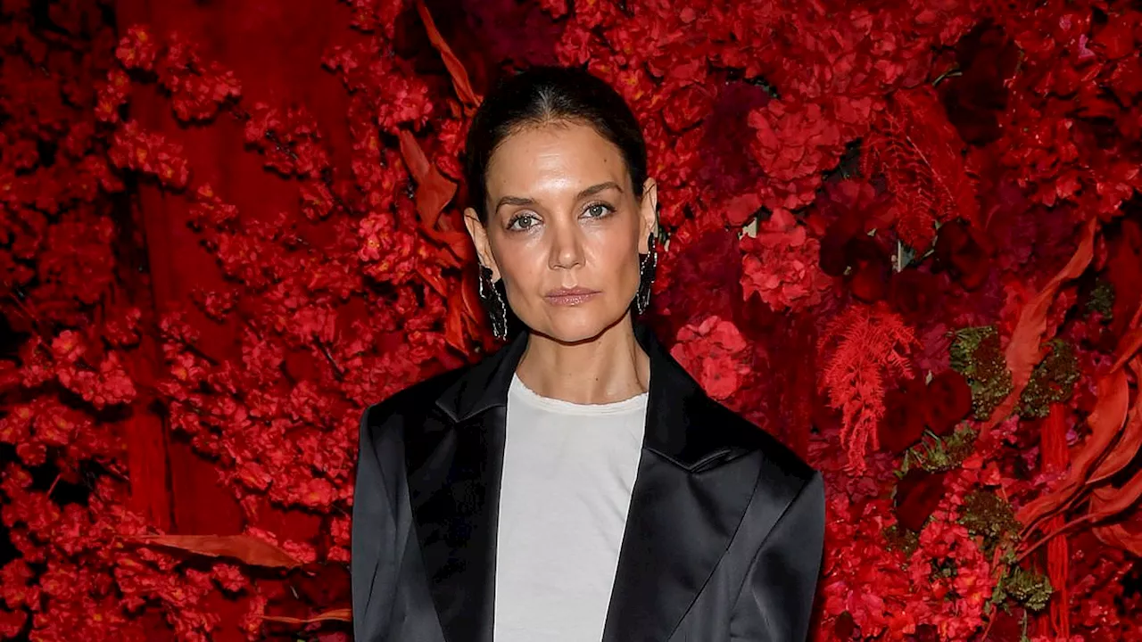 Katie Holmes glows in jacketed ensemble to support pal Christian Siriano at his New York Fashion...