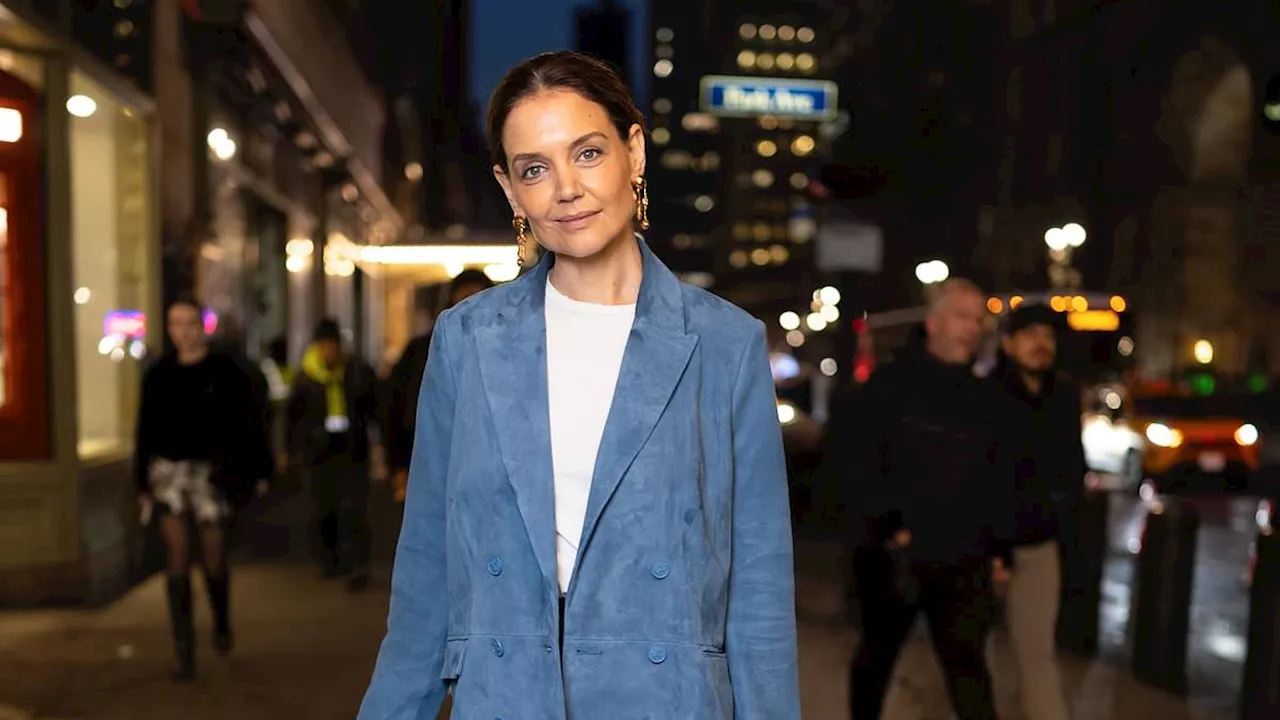 Katie Holmes pairs blue suede blazer with black silk skirt at L'AGENCE presentation at NYFW