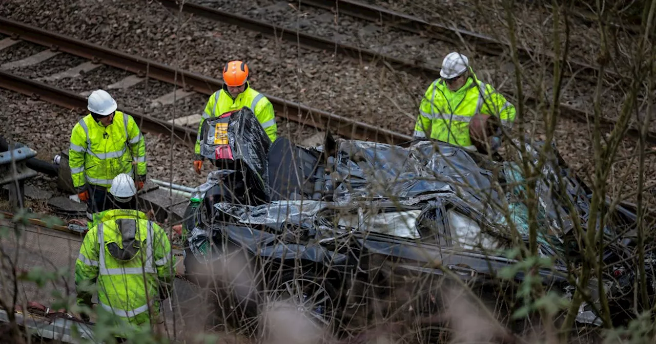 Car Crashes Onto Train Tracks, Causing Major Rail Disruptions in Manchester