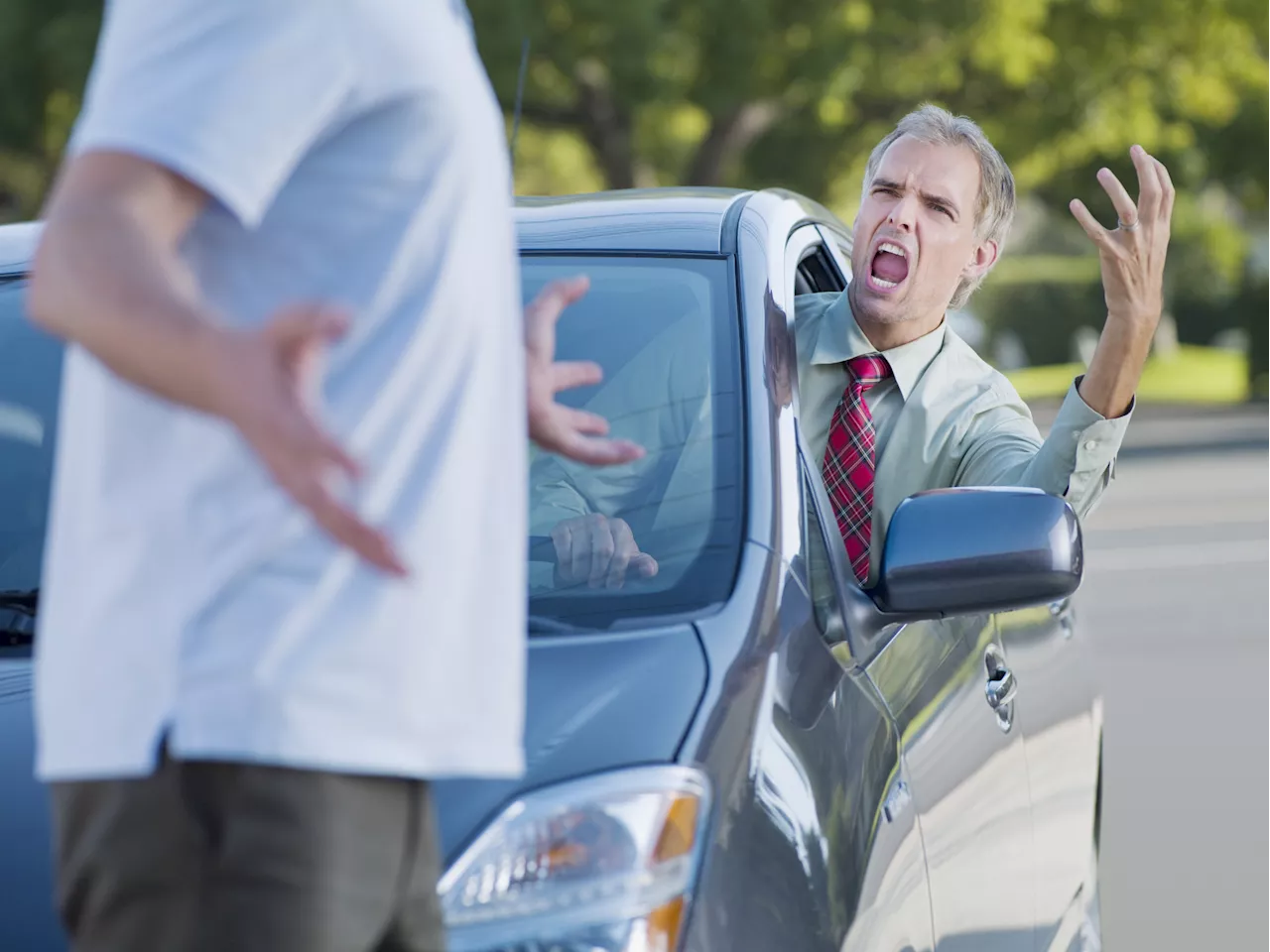 Pedestrian's Revenge on Reckless Driver Gives Internet Users Poetic Justice