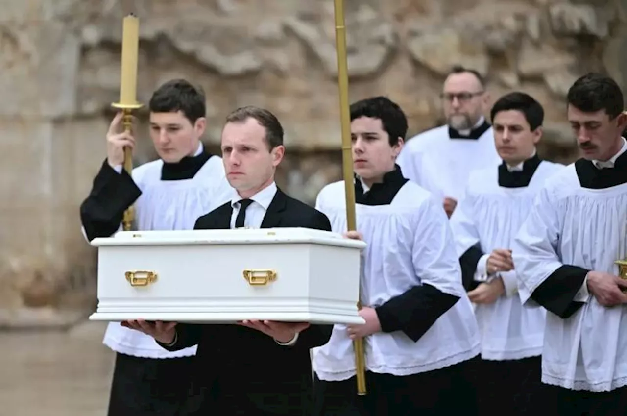 Hundreds of mourners bid farewell to French toddler