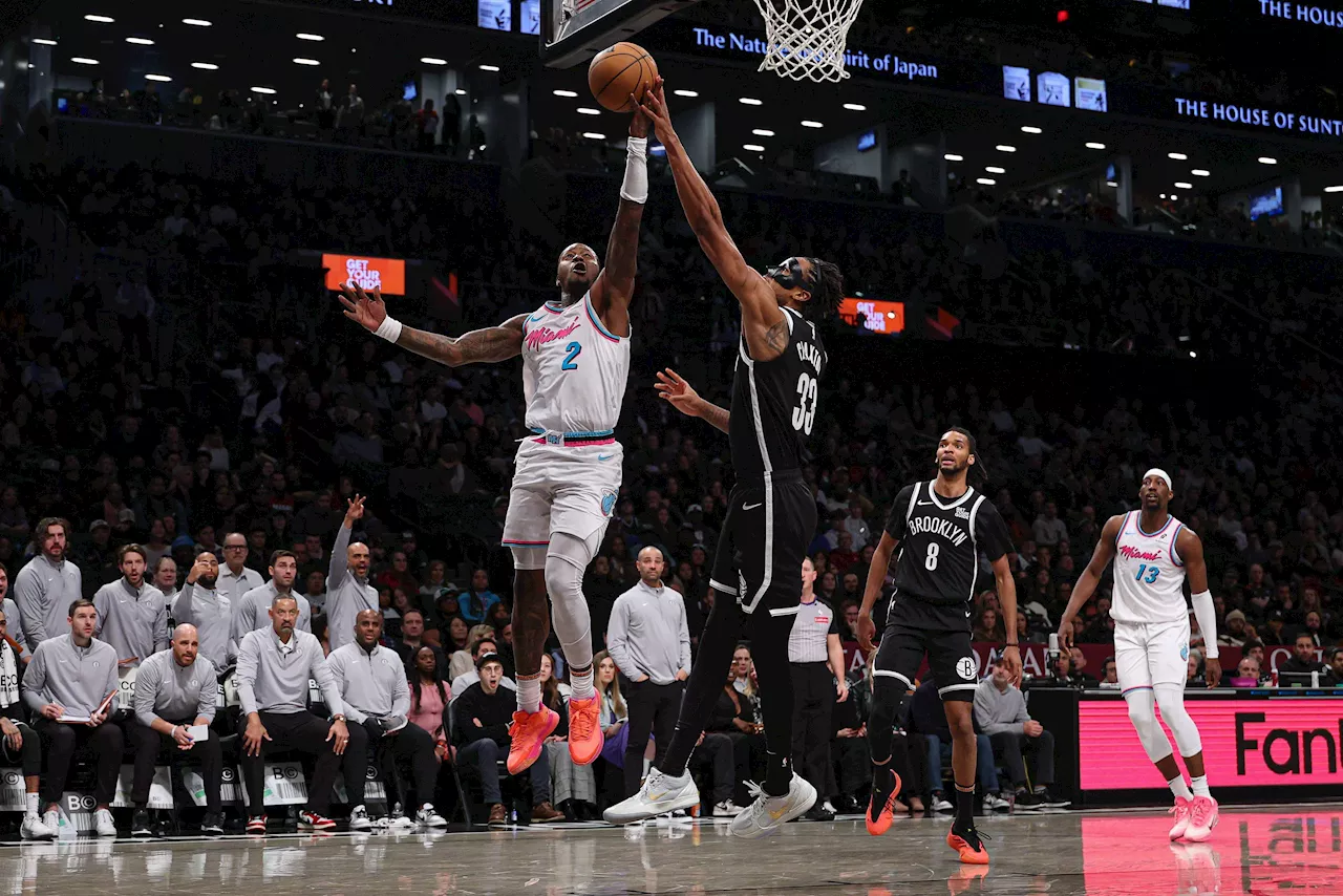 Nets Dominate Fourth Quarter to Beat Heat in Butler's Absence