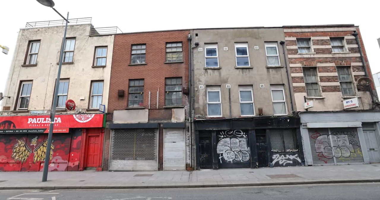 Why are so many properties derelict in Dublin city centre during a housing crisis?