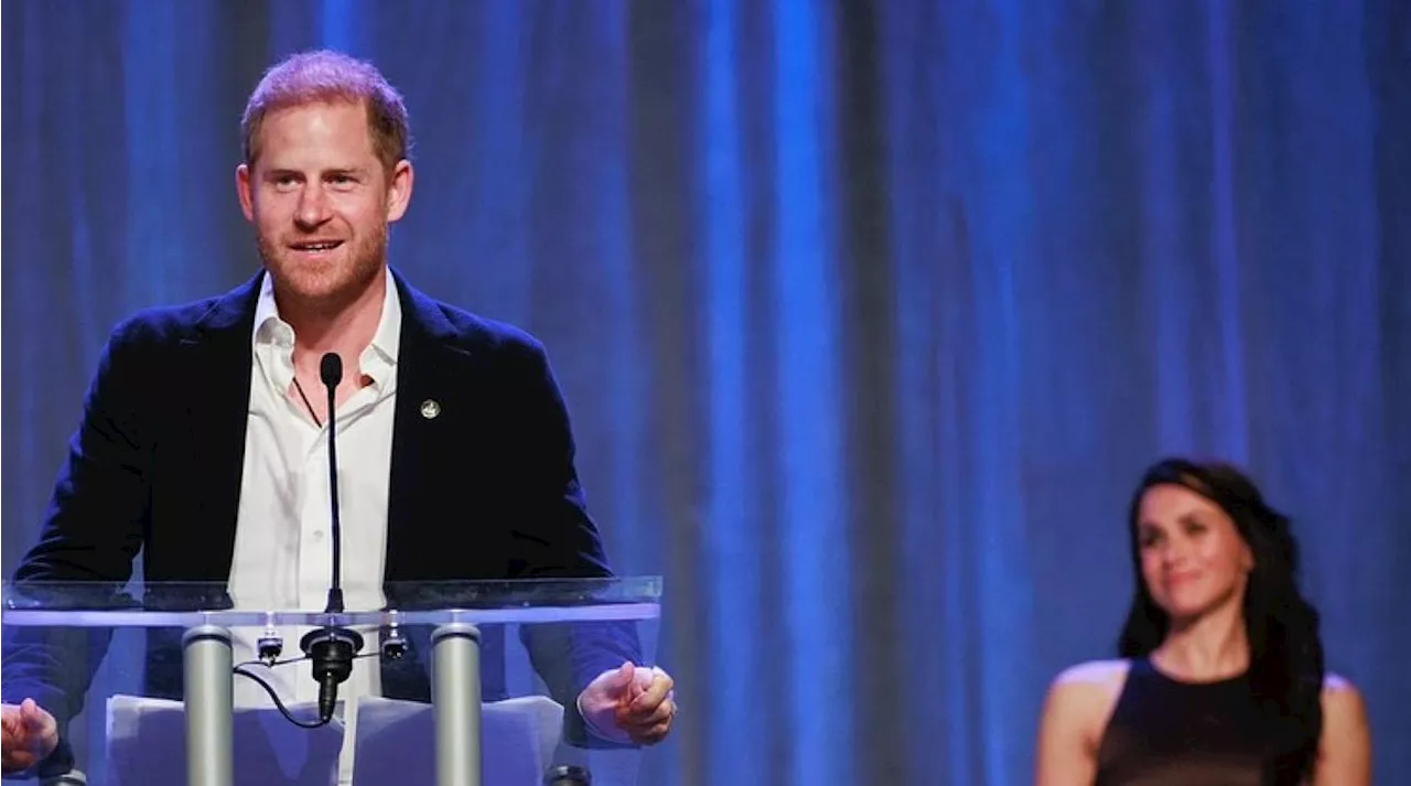 Meghan Markle Kisses Prince Harry at Invictus Games Event, Says He 'Means a Lot' to Her