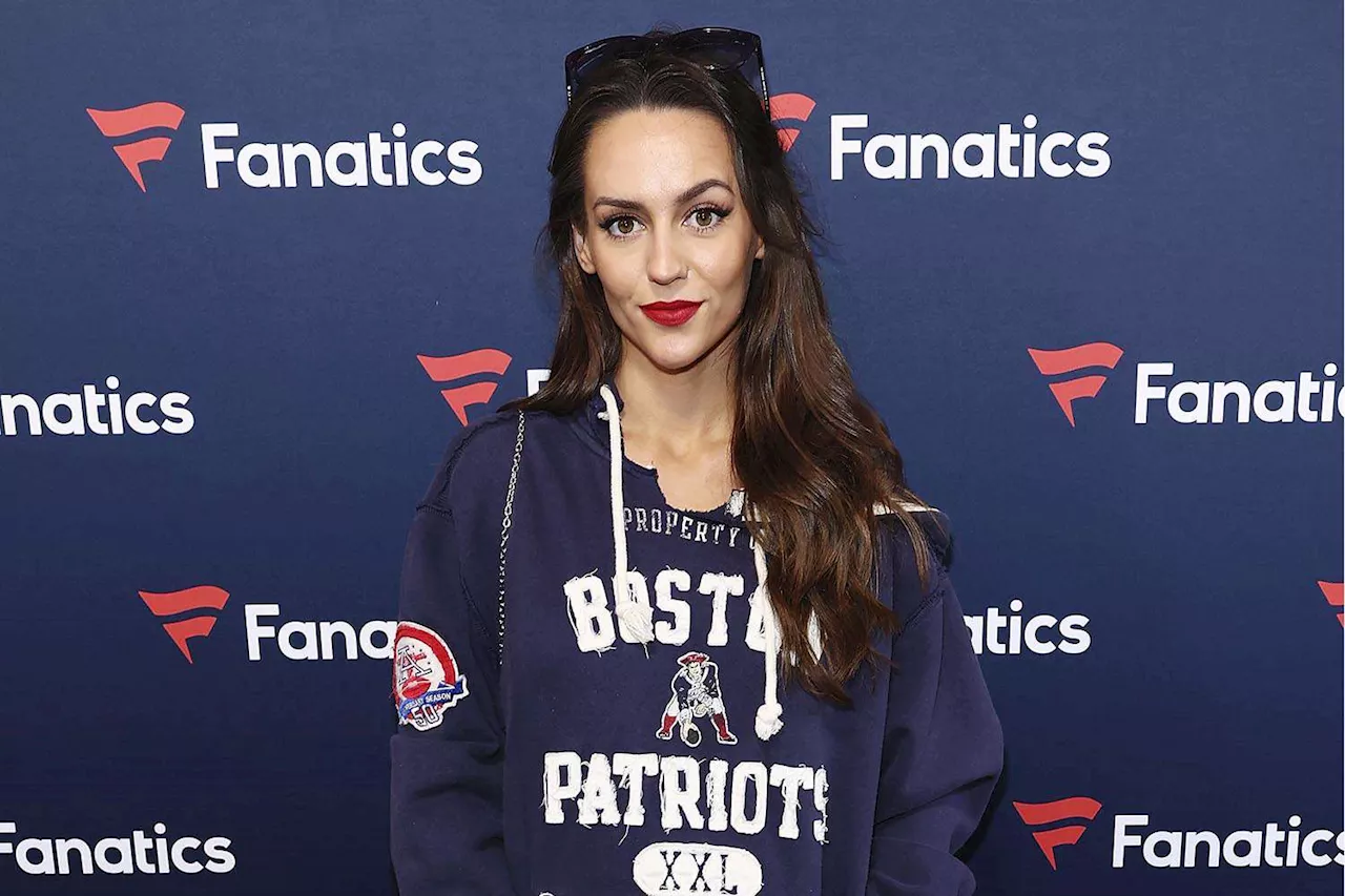 Jordon Hudson Wears Patriots Sweatshirt Dress as Boyfriend Bill Belichick Walks Separately into Fanatics Super Bowl Party