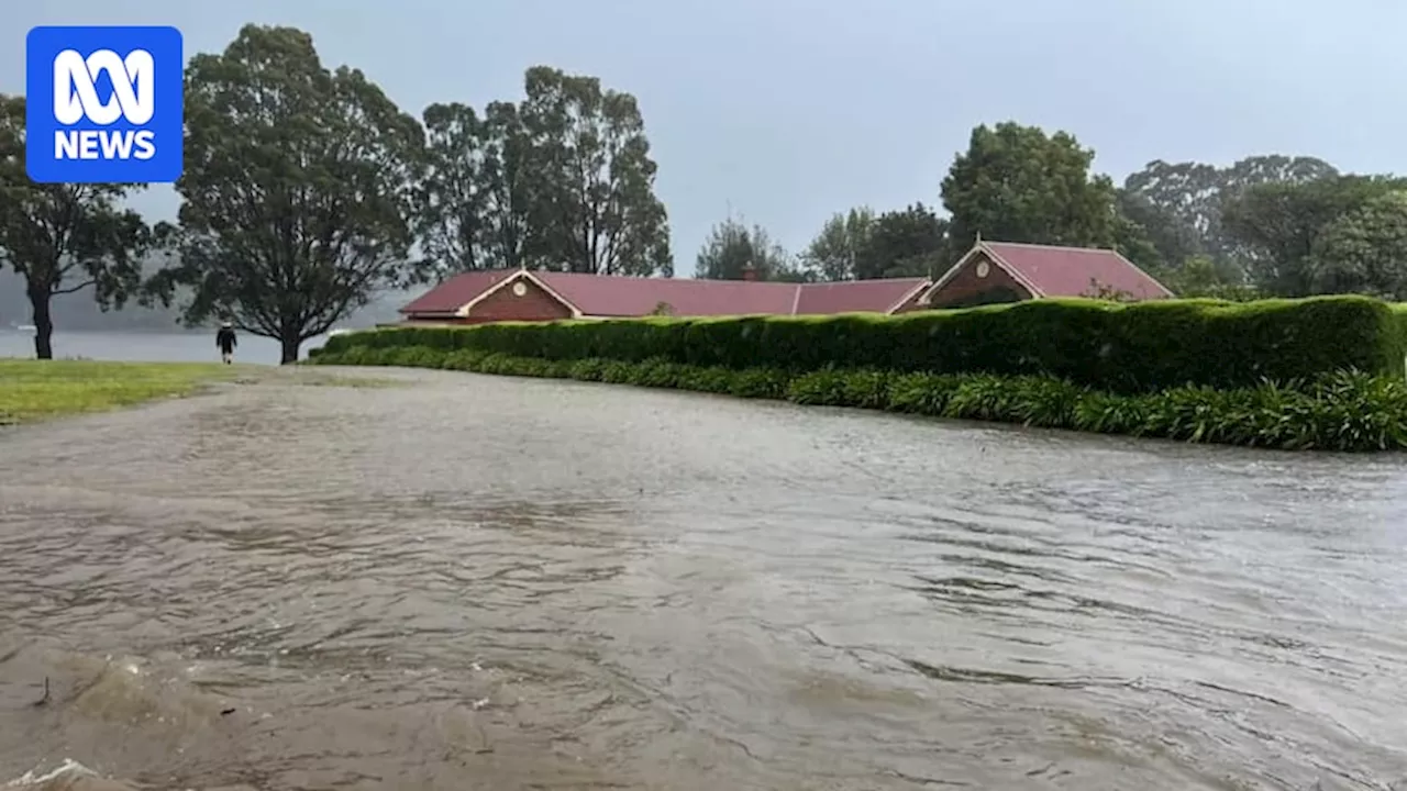 Flash flooding and emergency warnings as storms lash Victoria's east