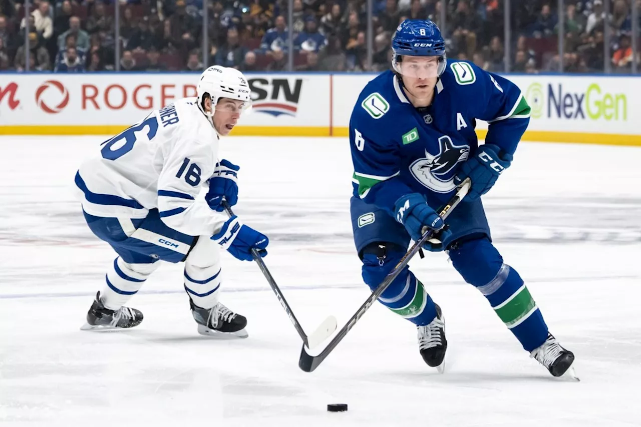 Canucks Edge Maple Leafs in Tight 2-1 Victory