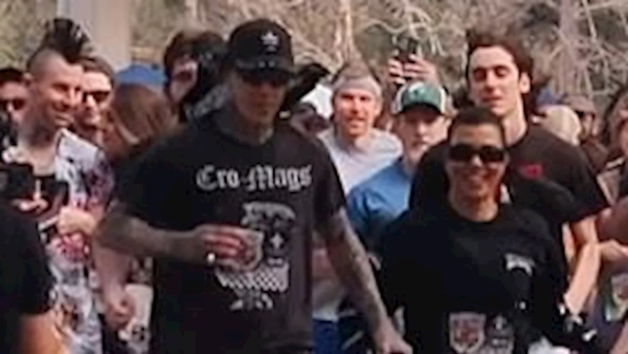 Kourtney Kardashian and Travis Barker hold hands while running 5K in New Orleans