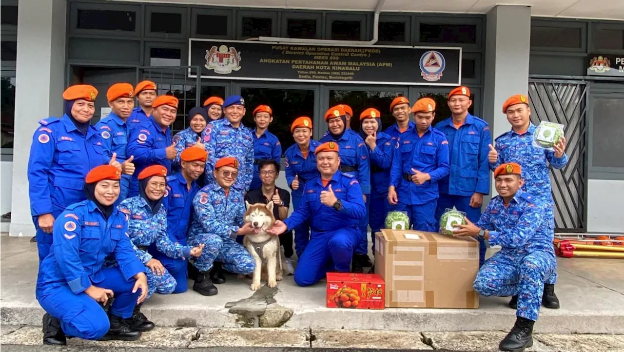 Husky thanks rescuers with surprise visit