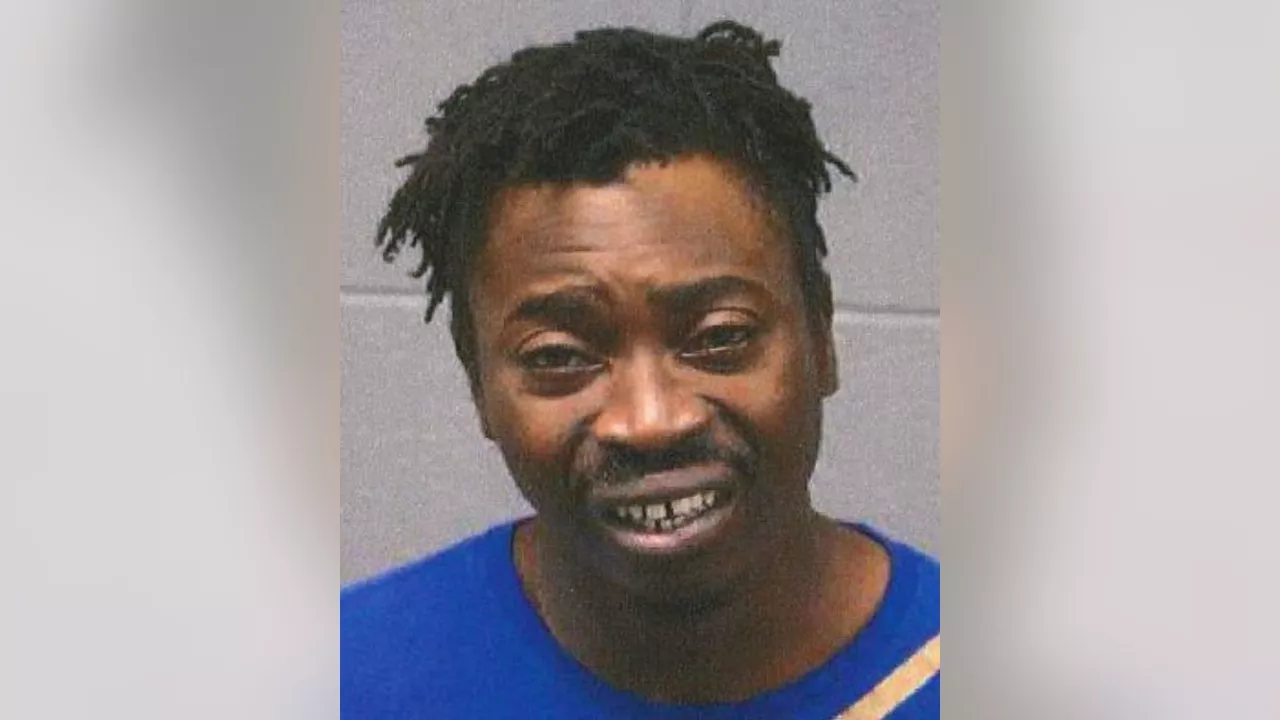 Lansing man charged with fatally shooting woman in Walmart parking lot