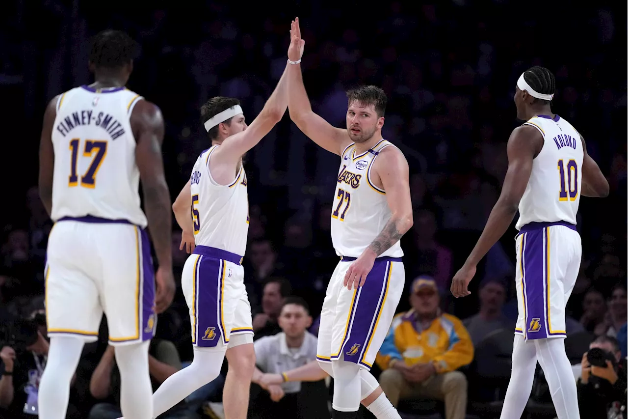 Doncic, Reaves combine for 61 as Lakers snap 4-game skid at slumping Suns’ expense