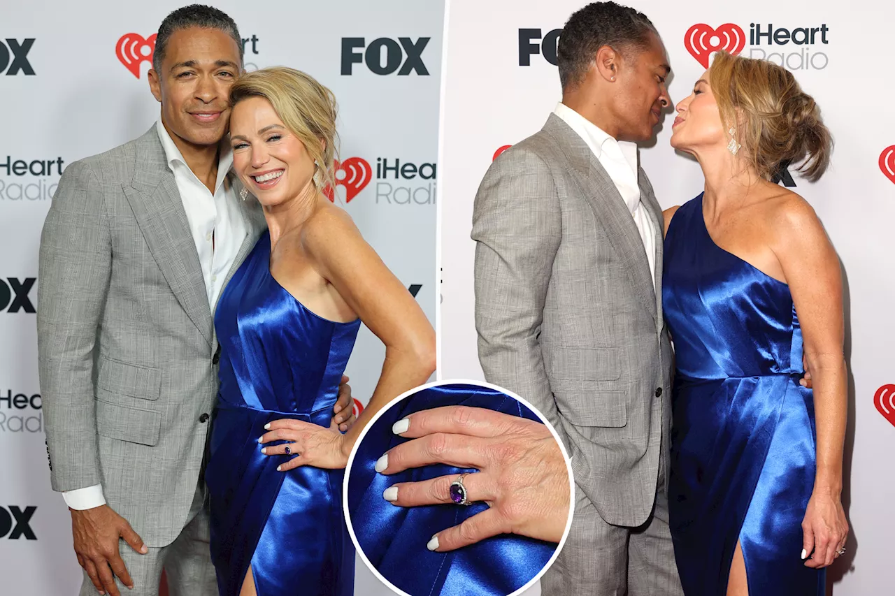 Amy Robach and T.J. Holmes spark engagement rumors as she flashes huge ring at iHeartRadio Music Awards 2025