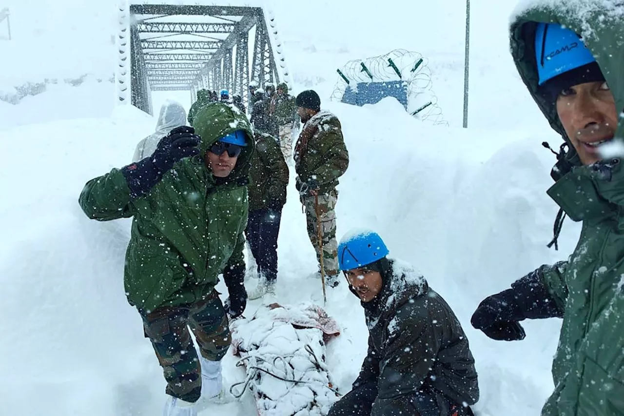 Rescuers search for eight workers after avalanche in India