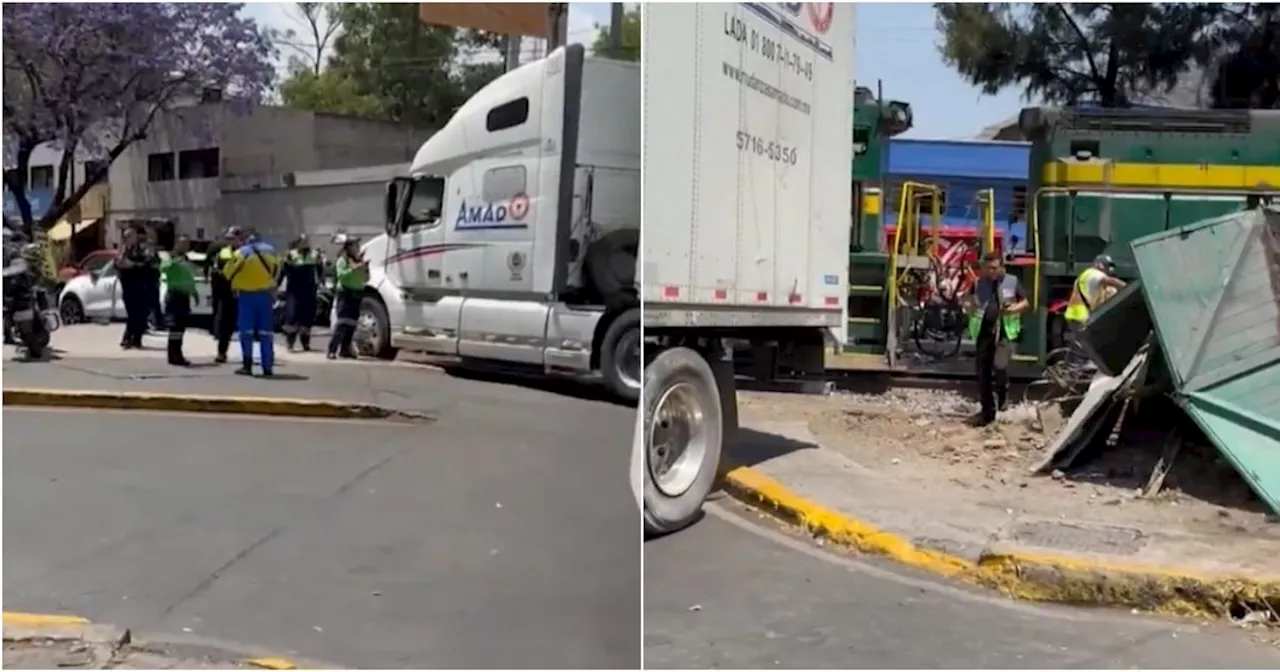Accidente con locomotora, tráiler y automóvil en Gustavo A. Madero