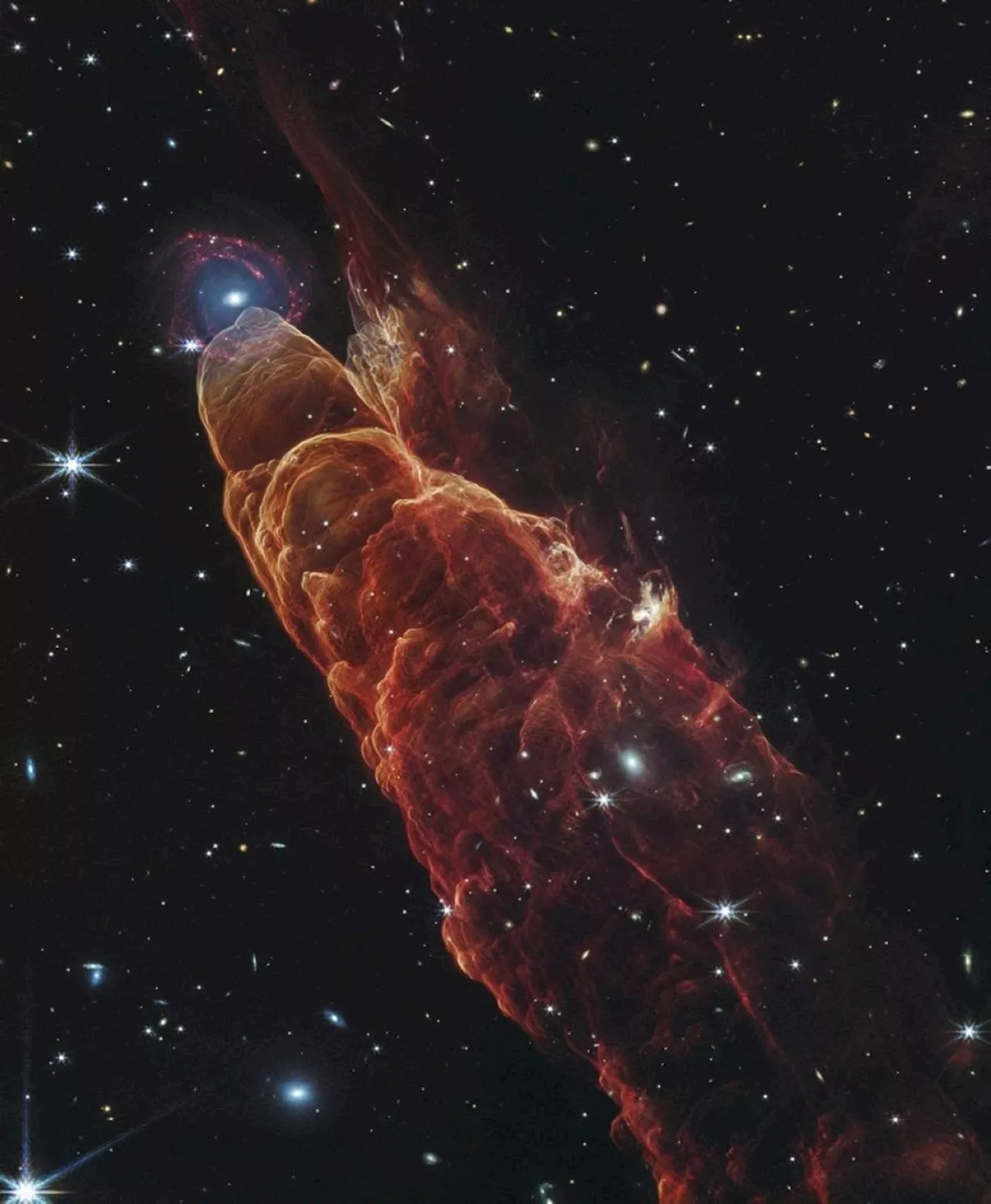 Webb Space Telescope captures a star in the making and a galaxy far, far away