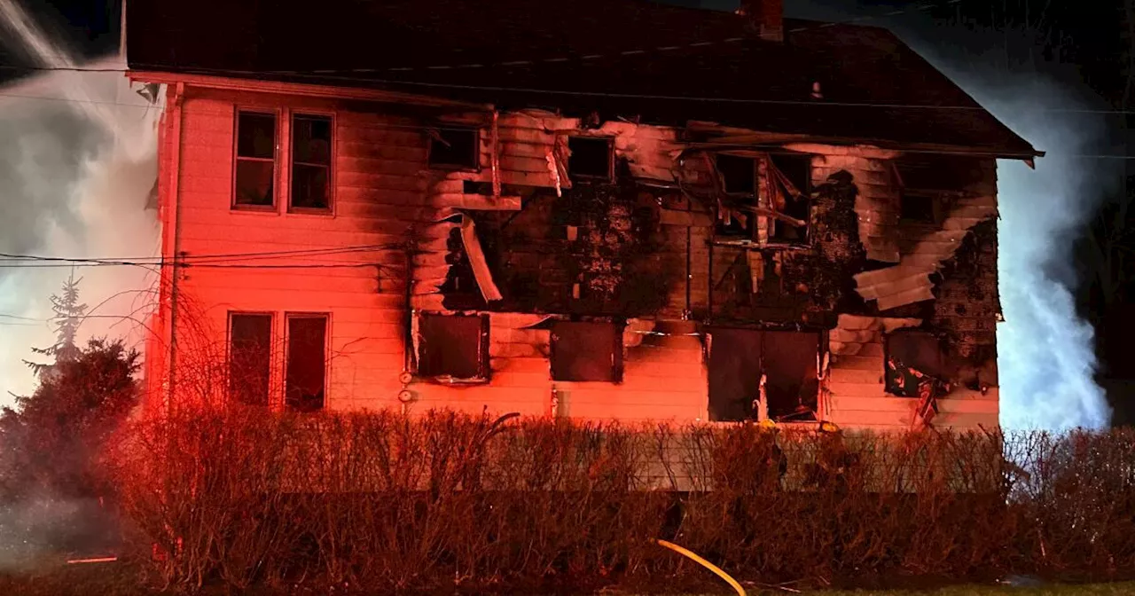 Standoff ends with house bursting into flames and suspect in police custody on Cleveland's Westside