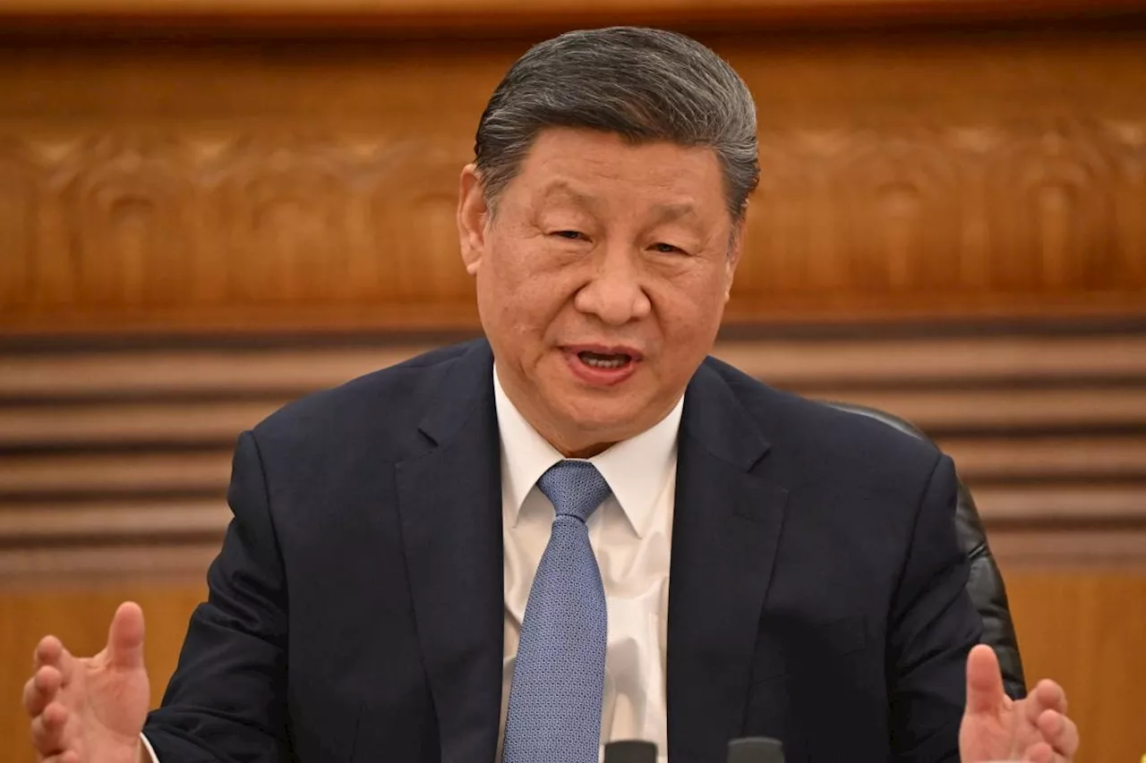 China's Xi warns foreign executives of 'severe' trade headwinds