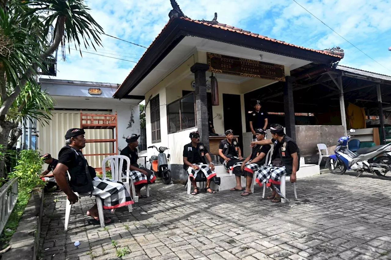 Lights out: Bali guards protect island's day of silence in Tuban